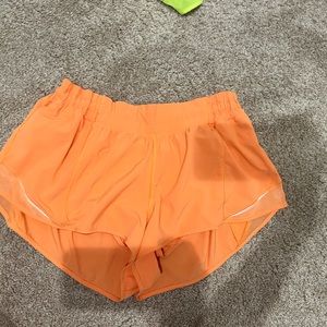 Orange Lululemon shorts